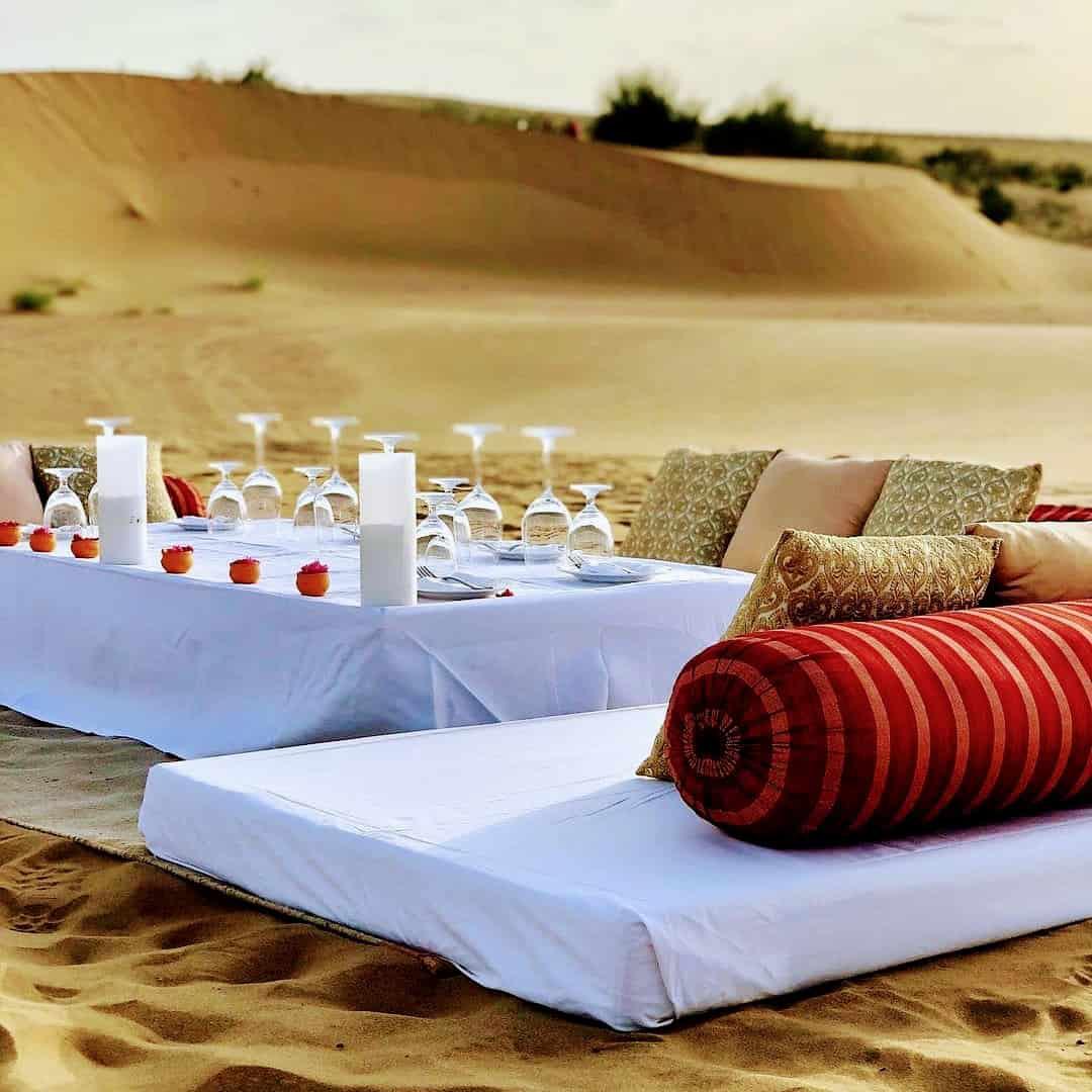 Private dinner table set on the dunes